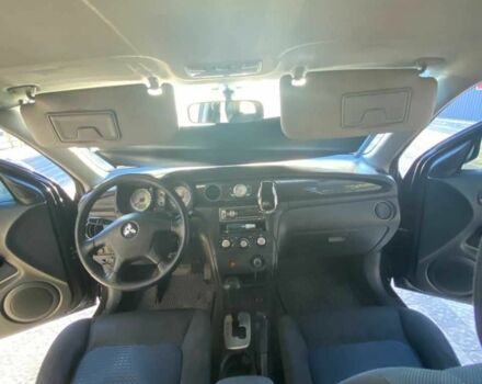 Черный Мицубиси Аутлендер, объемом двигателя 2.4 л и пробегом 219 тыс. км за 6500 $, фото 6 на Automoto.ua