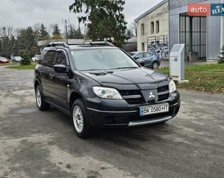Чорний Міцубісі Аутлендер, об'ємом двигуна 2 л та пробігом 290 тис. км за 5000 $, фото 15 на Automoto.ua