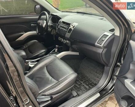 Черный Мицубиси Аутлендер, объемом двигателя 3 л и пробегом 200 тыс. км за 7999 $, фото 24 на Automoto.ua