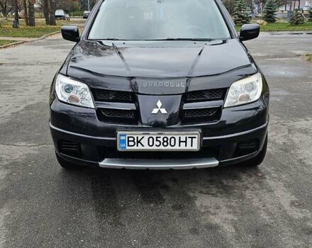 Чорний Міцубісі Аутлендер, об'ємом двигуна 2 л та пробігом 290 тис. км за 4200 $, фото 1 на Automoto.ua