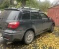 Черный Мицубиси Аутлендер, объемом двигателя 2 л и пробегом 260 тыс. км за 5300 $, фото 1 на Automoto.ua