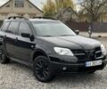 Міцубісі Аутлендер 2007 у Харкові на Automoto.ua Чорний Міцубісі Аутлендер, об'ємом двигуна 2.4 л та пробігом 240 тис. км за 5600 $, фото 9 на Automoto.ua