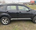 Черный Мицубиси Аутлендер, объемом двигателя 3 л и пробегом 300 тыс. км за 9500 $, фото 3 на Automoto.ua