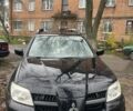 Черный Мицубиси Аутлендер, объемом двигателя 2 л и пробегом 430 тыс. км за 4300 $, фото 1 на Automoto.ua