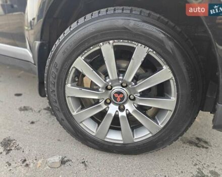 Черный Мицубиси Аутлендер, объемом двигателя 3 л и пробегом 155 тыс. км за 9800 $, фото 24 на Automoto.ua