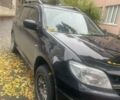Черный Мицубиси Аутлендер, объемом двигателя 2 л и пробегом 260 тыс. км за 5300 $, фото 6 на Automoto.ua