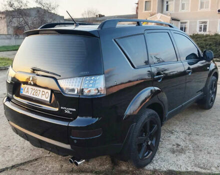Черный Мицубиси Аутлендер, объемом двигателя 3 л и пробегом 225 тыс. км за 9200 $, фото 4 на Automoto.ua