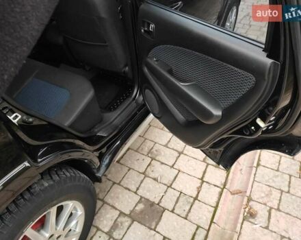 Черный Мицубиси Аутлендер, объемом двигателя 2 л и пробегом 180 тыс. км за 6000 $, фото 13 на Automoto.ua