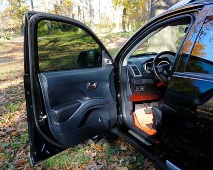 Міцубісі Аутлендер 2007 у Белой Церкве на Automoto.ua Чорний Міцубісі Аутлендер, об'ємом двигуна 3 л та пробігом 230 тис. км за 8800 $, фото 7 на Automoto.ua