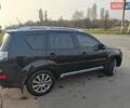 Черный Мицубиси Аутлендер, объемом двигателя 3 л и пробегом 155 тыс. км за 9800 $, фото 3 на Automoto.ua