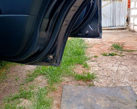 Черный Мицубиси Аутлендер, объемом двигателя 2 л и пробегом 218 тыс. км за 10500 $, фото 6 на Automoto.ua