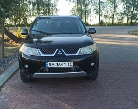 Черный Мицубиси Аутлендер, объемом двигателя 1.97 л и пробегом 244 тыс. км за 9000 $, фото 8 на Automoto.ua
