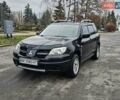 Чорний Міцубісі Аутлендер, об'ємом двигуна 2 л та пробігом 290 тис. км за 5000 $, фото 1 на Automoto.ua