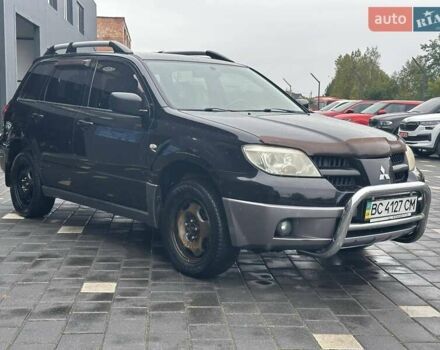 Черный Мицубиси Аутлендер, объемом двигателя 2 л и пробегом 295 тыс. км за 5300 $, фото 10 на Automoto.ua