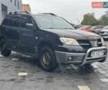 Черный Мицубиси Аутлендер, объемом двигателя 2 л и пробегом 295 тыс. км за 5300 $, фото 10 на Automoto.ua