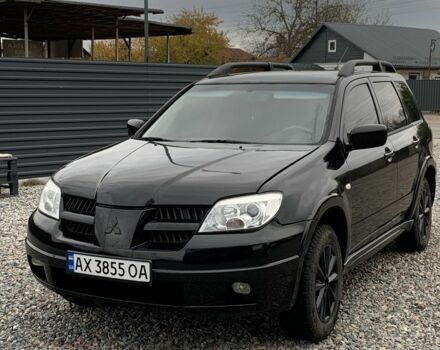 Міцубісі Аутлендер 2007 у Харкові на Automoto.ua Чорний Міцубісі Аутлендер, об'ємом двигуна 2.4 л та пробігом 240 тис. км за 5600 $, фото 5 на Automoto.ua