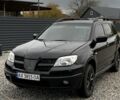 Міцубісі Аутлендер 2007 у Харкові на Automoto.ua Чорний Міцубісі Аутлендер, об'ємом двигуна 2.4 л та пробігом 240 тис. км за 5600 $, фото 5 на Automoto.ua