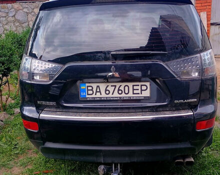 Черный Мицубиси Аутлендер, объемом двигателя 2 л и пробегом 218 тыс. км за 10500 $, фото 4 на Automoto.ua