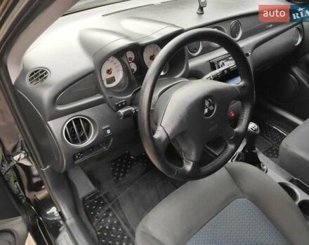 Черный Мицубиси Аутлендер, объемом двигателя 2 л и пробегом 180 тыс. км за 6000 $, фото 9 на Automoto.ua