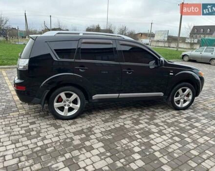 Черный Мицубиси Аутлендер, объемом двигателя 3 л и пробегом 200 тыс. км за 7999 $, фото 19 на Automoto.ua