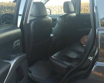 Черный Мицубиси Аутлендер, объемом двигателя 1.97 л и пробегом 244 тыс. км за 9000 $, фото 15 на Automoto.ua