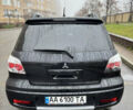 Чорний Міцубісі Аутлендер, об'ємом двигуна 2.4 л та пробігом 169 тис. км за 8000 $, фото 1 на Automoto.ua