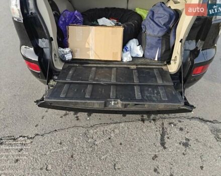 Черный Мицубиси Аутлендер, объемом двигателя 3 л и пробегом 155 тыс. км за 9800 $, фото 21 на Automoto.ua