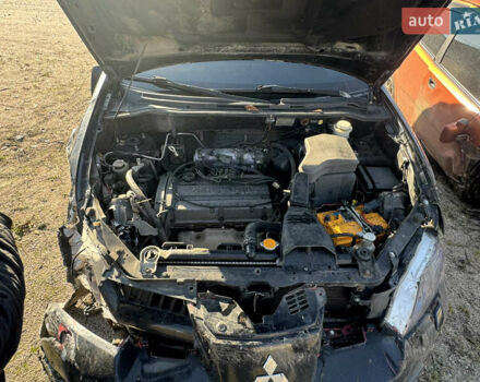 Черный Мицубиси Аутлендер, объемом двигателя 2 л и пробегом 258 тыс. км за 2200 $, фото 21 на Automoto.ua