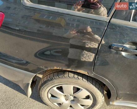 Чорний Міцубісі Аутлендер, об'ємом двигуна 2 л та пробігом 260 тис. км за 5500 $, фото 8 на Automoto.ua