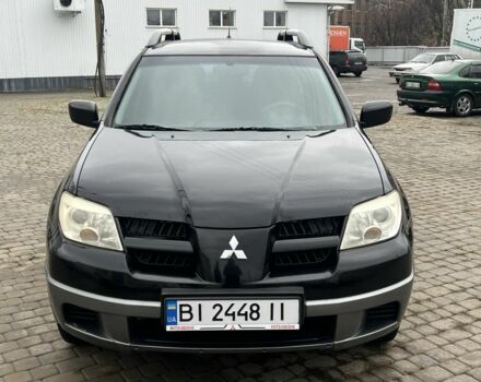 Чорний Міцубісі Аутлендер, об'ємом двигуна 2 л та пробігом 220 тис. км за 6299 $, фото 9 на Automoto.ua