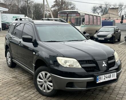 Чорний Міцубісі Аутлендер, об'ємом двигуна 2 л та пробігом 220 тис. км за 6299 $, фото 2 на Automoto.ua