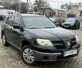 Чорний Міцубісі Аутлендер, об'ємом двигуна 2 л та пробігом 220 тис. км за 6299 $, фото 2 на Automoto.ua