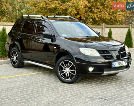 Міцубісі Аутлендер 2007 у Одесі на Automoto.ua Чорний Міцубісі Аутлендер, об'ємом двигуна 2.4 л та пробігом 201 тис. км за 7700 $, фото 1 на Automoto.ua