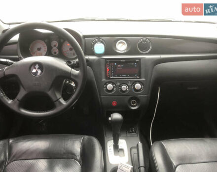 Черный Мицубиси Аутлендер, объемом двигателя 2.38 л и пробегом 314 тыс. км за 5000 $, фото 9 на Automoto.ua