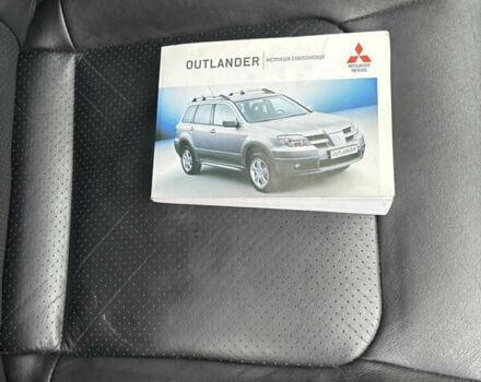 Чорний Міцубісі Аутлендер, об'ємом двигуна 2.4 л та пробігом 169 тис. км за 8000 $, фото 18 на Automoto.ua