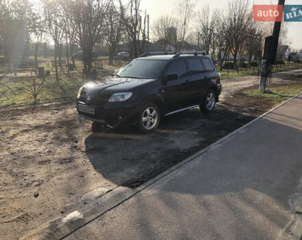 Черный Мицубиси Аутлендер, объемом двигателя 2.4 л и пробегом 260 тыс. км за 7200 $, фото 10 на Automoto.ua