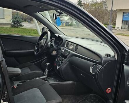 Черный Мицубиси Аутлендер, объемом двигателя 2 л и пробегом 290 тыс. км за 4000 $, фото 15 на Automoto.ua