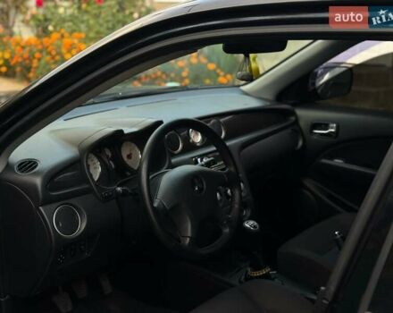 Чорний Міцубісі Аутлендер, об'ємом двигуна 2 л та пробігом 280 тис. км за 7500 $, фото 11 на Automoto.ua