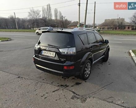 Черный Мицубиси Аутлендер, объемом двигателя 3 л и пробегом 155 тыс. км за 9800 $, фото 6 на Automoto.ua