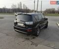 Черный Мицубиси Аутлендер, объемом двигателя 3 л и пробегом 155 тыс. км за 9800 $, фото 6 на Automoto.ua