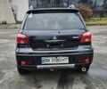 Чорний Міцубісі Аутлендер, об'ємом двигуна 2 л та пробігом 200 тис. км за 4700 $, фото 4 на Automoto.ua