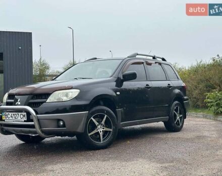 Черный Мицубиси Аутлендер, объемом двигателя 2 л и пробегом 295 тыс. км за 5300 $, фото 18 на Automoto.ua