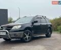 Черный Мицубиси Аутлендер, объемом двигателя 2 л и пробегом 295 тыс. км за 5300 $, фото 18 на Automoto.ua