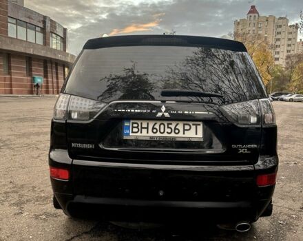 Черный Мицубиси Аутлендер, объемом двигателя 2.4 л и пробегом 230 тыс. км за 8500 $, фото 6 на Automoto.ua