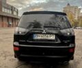Черный Мицубиси Аутлендер, объемом двигателя 2.4 л и пробегом 230 тыс. км за 8500 $, фото 6 на Automoto.ua