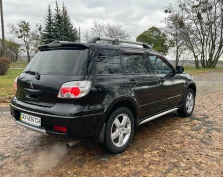 Черный Мицубиси Аутлендер, объемом двигателя 2.4 л и пробегом 213 тыс. км за 6850 $, фото 7 на Automoto.ua