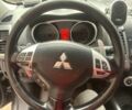 Черный Мицубиси Аутлендер, объемом двигателя 2.4 л и пробегом 240 тыс. км за 8500 $, фото 5 на Automoto.ua