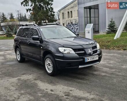 Чорний Міцубісі Аутлендер, об'ємом двигуна 2 л та пробігом 290 тис. км за 5000 $, фото 12 на Automoto.ua