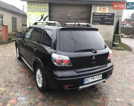Черный Мицубиси Аутлендер, объемом двигателя 2 л и пробегом 284 тыс. км за 4999 $, фото 10 на Automoto.ua