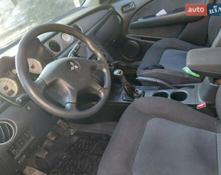 Чорний Міцубісі Аутлендер, об'ємом двигуна 2 л та пробігом 260 тис. км за 5500 $, фото 4 на Automoto.ua